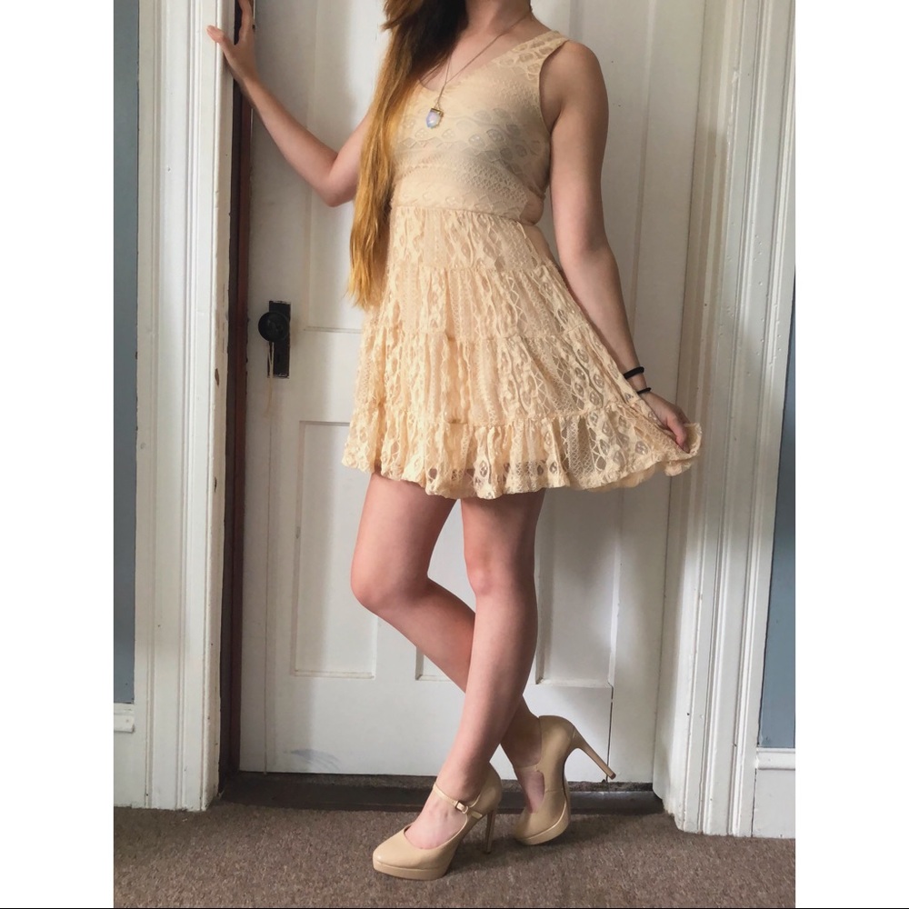 Lacey Cream Dress with Ruffled Skirt